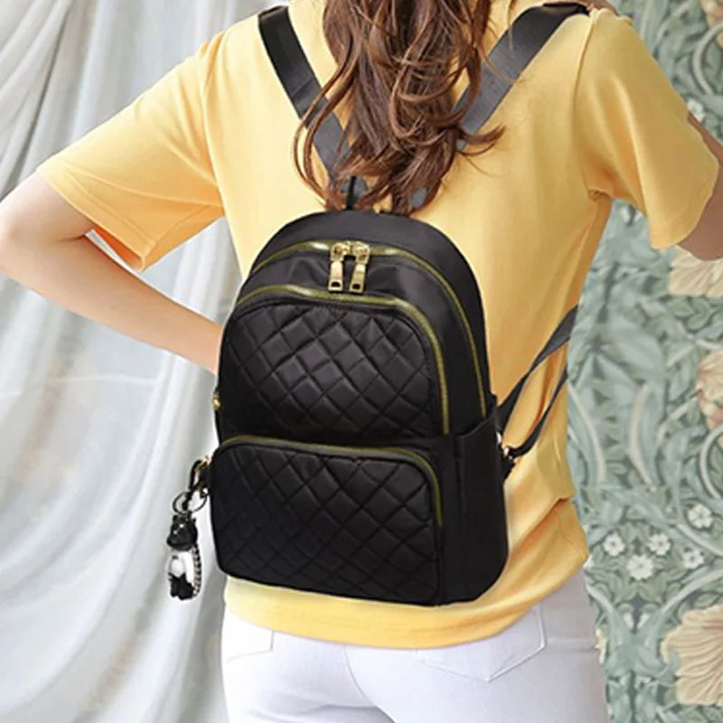 Elegant Stylish Quilted Backpack Black Adjustable-Strap Lightweight with Charm for Daily Use Casual Functional Compact Bag