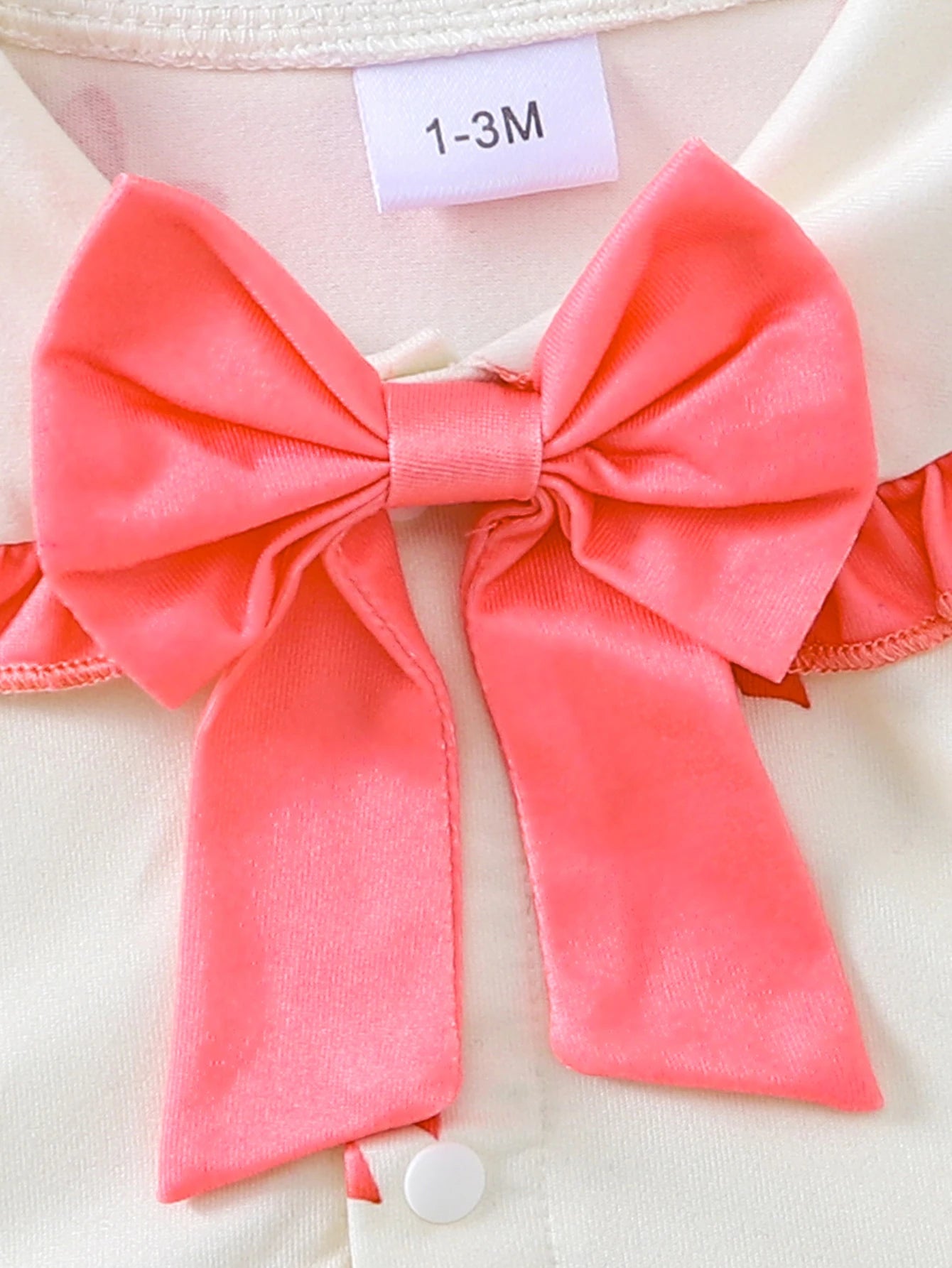 【Baby Girl Bowknot Romper】Autumn & Winter Style: Cream Base with Fuchsia Bowknot Print, featuring a doll collar and large bowkno