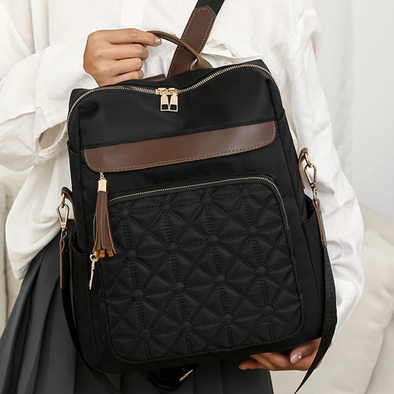 Neutral color square backpack for men and women, featuring plain design, suitable for travel and student use.