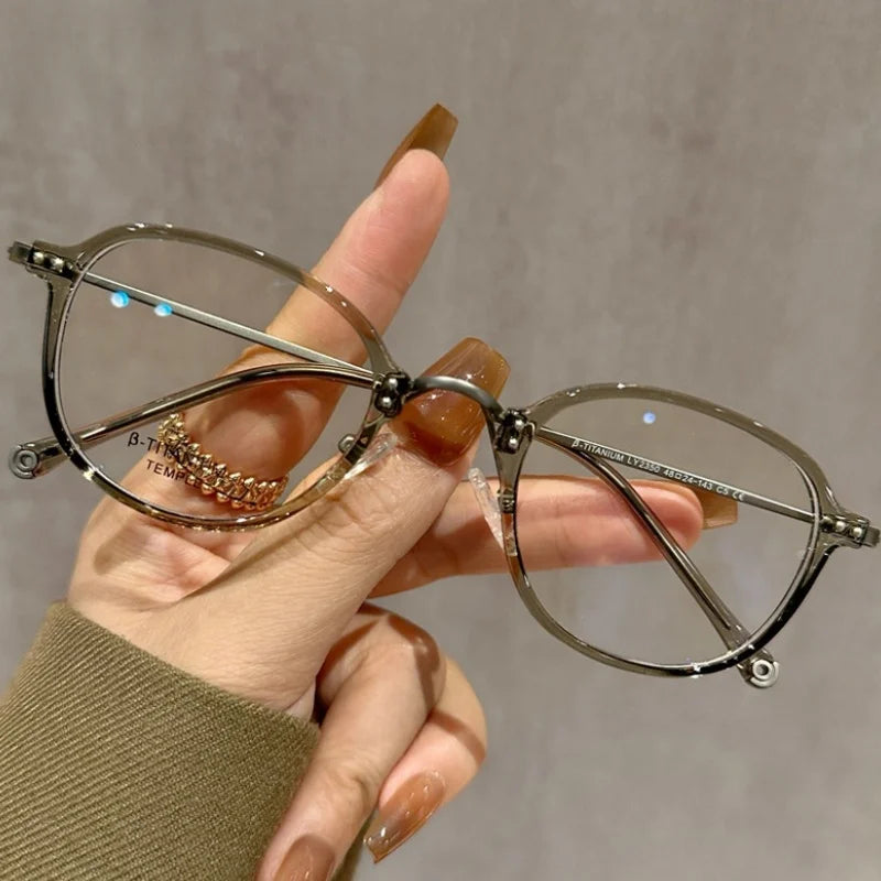 Stylish Half Titanium Oval Eyeglasses for Women | Fashion Meets Function