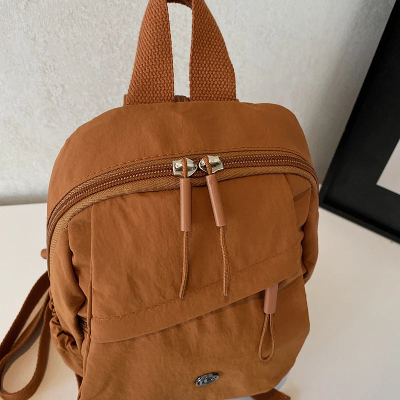Versatile Solid Color Unisex Small Backpack | Large Capacity Design