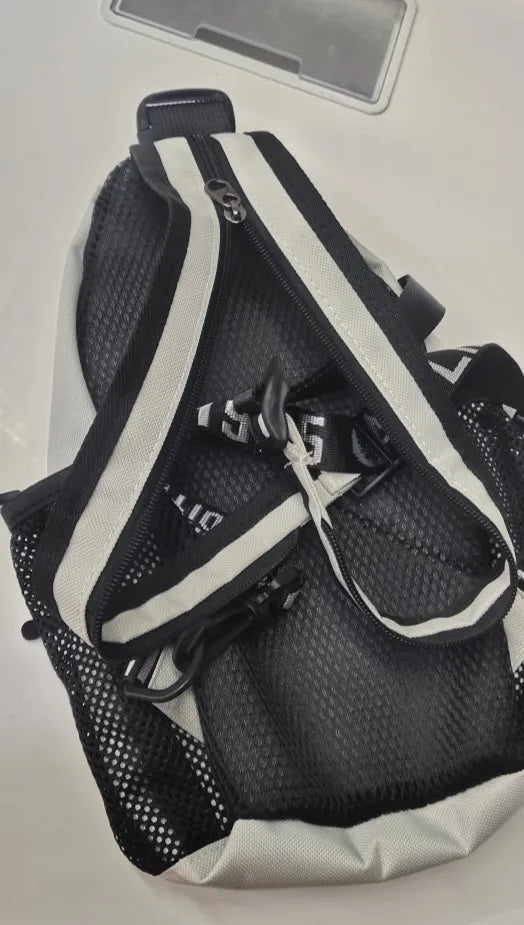 Stylish Crossbody Chest Bag with Headphone Jack & Phone Pocket