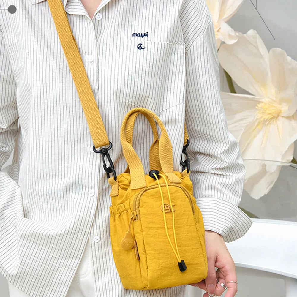 Women's Water-Resistant Crossbody Bag with Phone Pocket & Bottle Holder