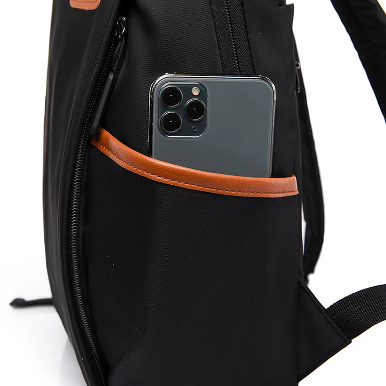 Laptop backpack with multiple pockets, adjustable shoulder straps, zipper closure, multi-purpose, school backpack