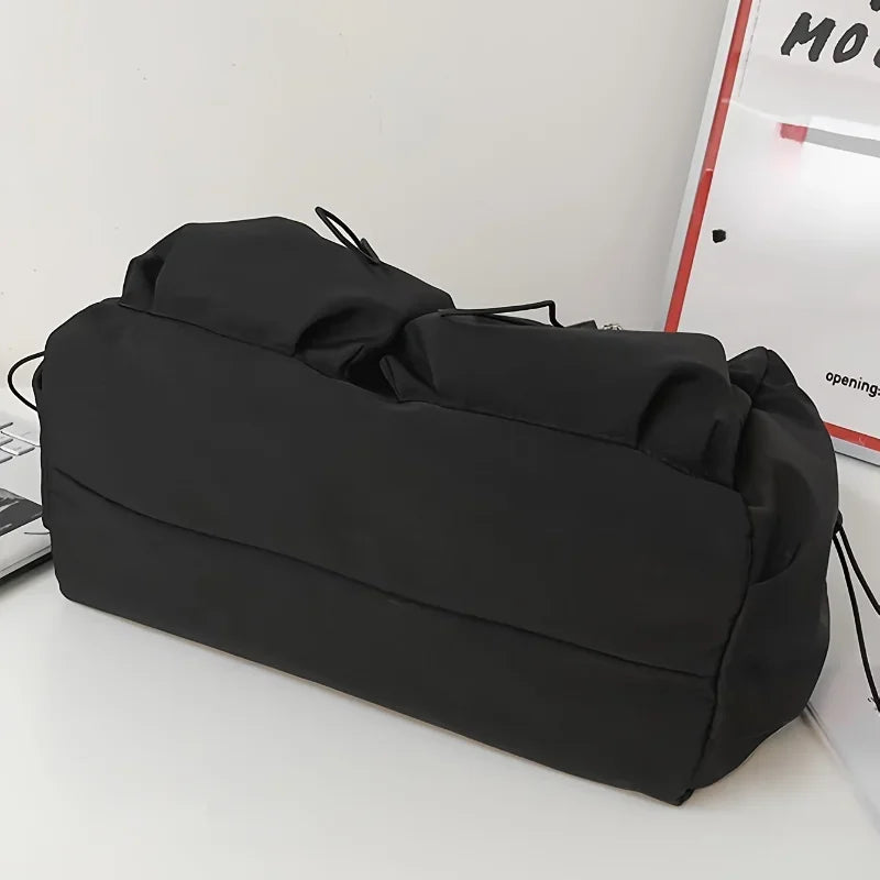 Fashionable Crossbody Bag with Stylish Charm & Drawstring Accent