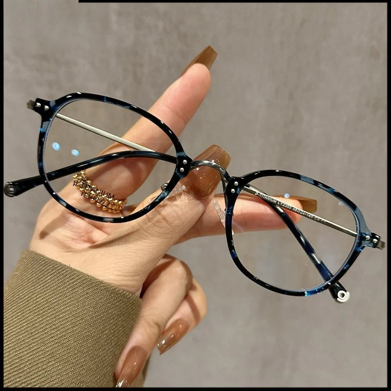 Stylish Half Titanium Oval Eyeglasses for Women | Fashion Meets Function