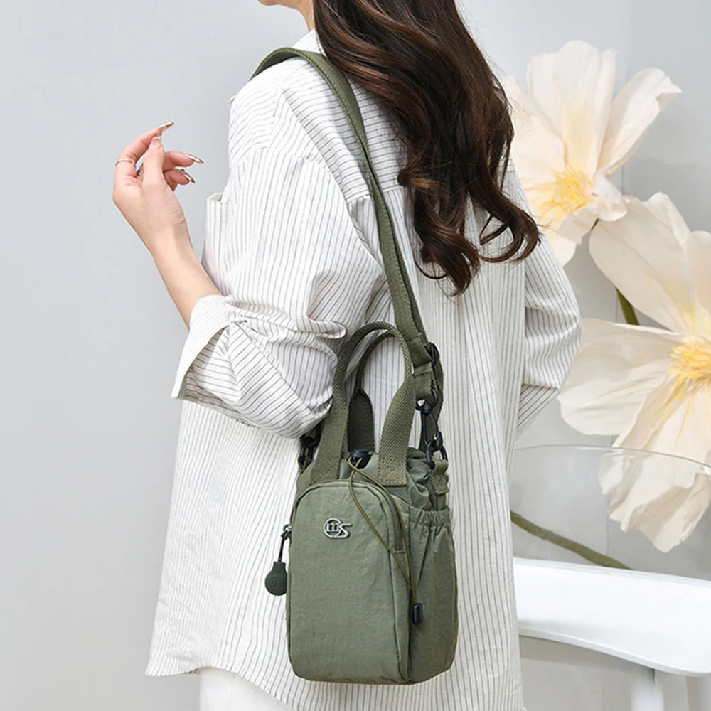 Women's Water-Resistant Crossbody Bag with Phone Pocket & Bottle Holder