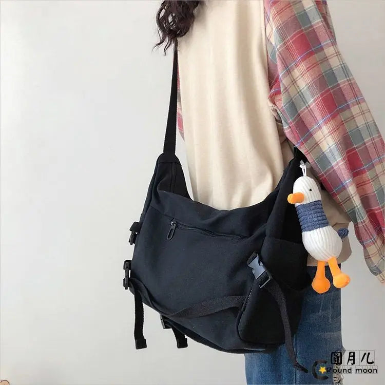 Stylish Canvas Messenger Bag | Versatile & Spacious Travel Companion