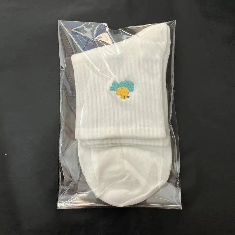 Couple-style socks for cross-border export. Women's style winter and autumn mid-length socks in white. Men's socks.