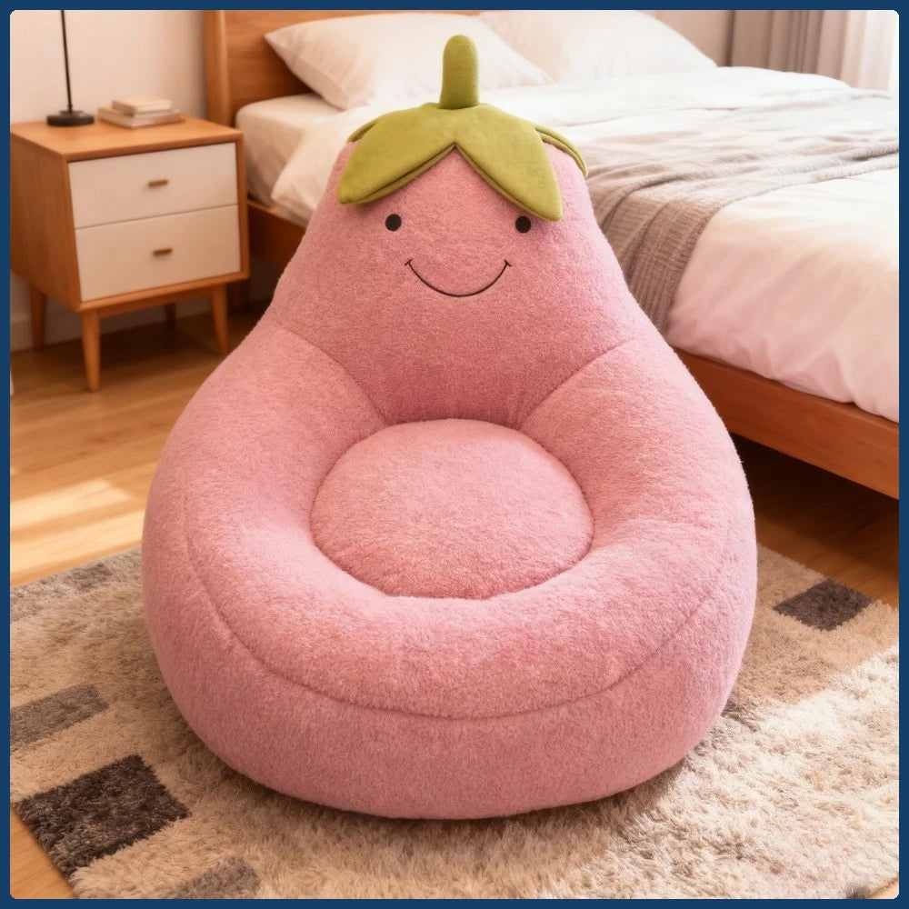 Pink bean bag chair shaped like a pear with a green leaf on a bedroom floor.