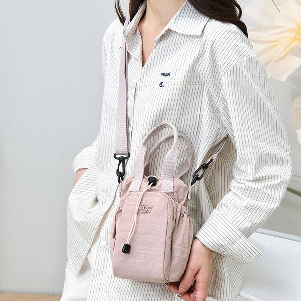 Women's Water-Resistant Crossbody Bag with Phone Pocket & Bottle Holder