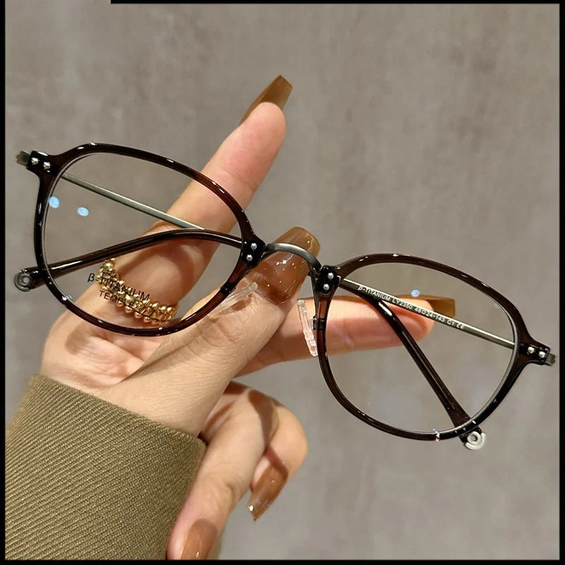 Stylish Half Titanium Oval Eyeglasses for Women | Fashion Meets Function