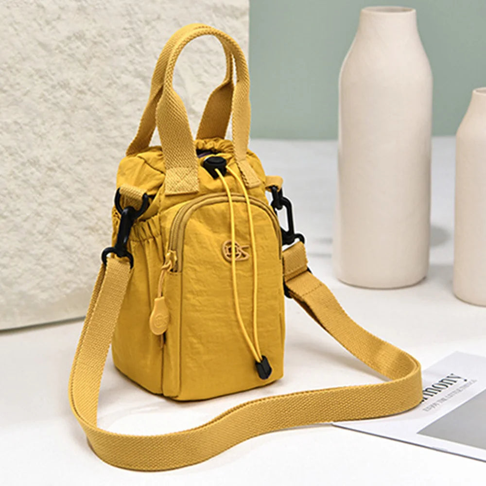 Women's Water-Resistant Crossbody Bag with Phone Pocket & Bottle Holder