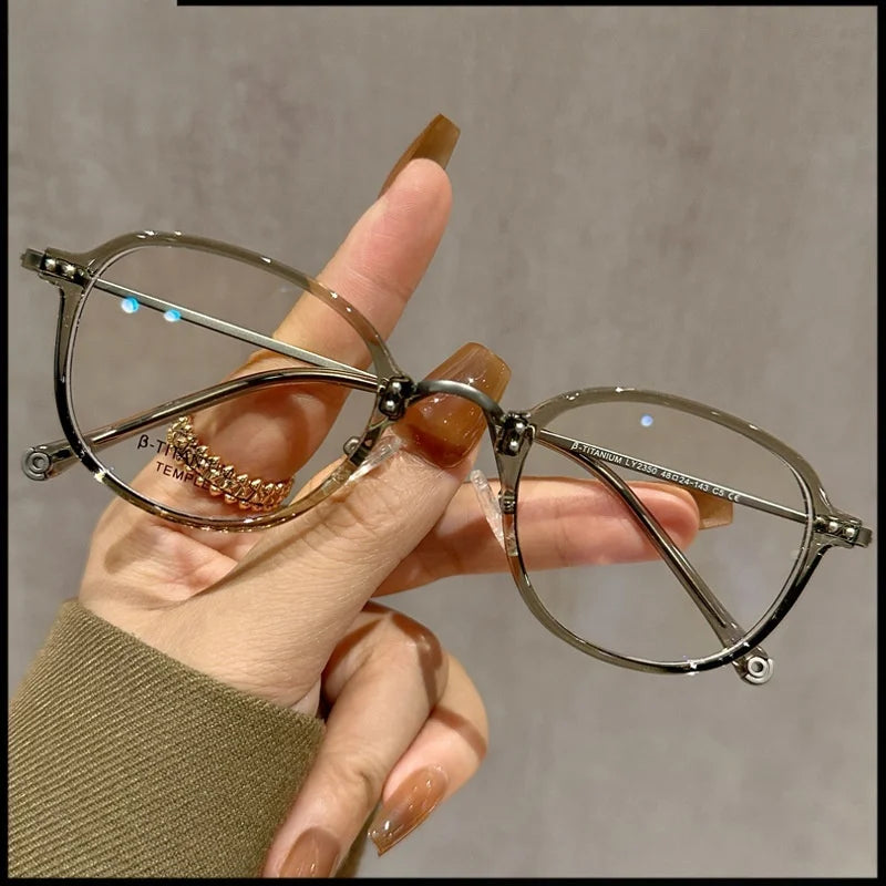 Stylish Half Titanium Oval Eyeglasses for Women | Fashion Meets Function