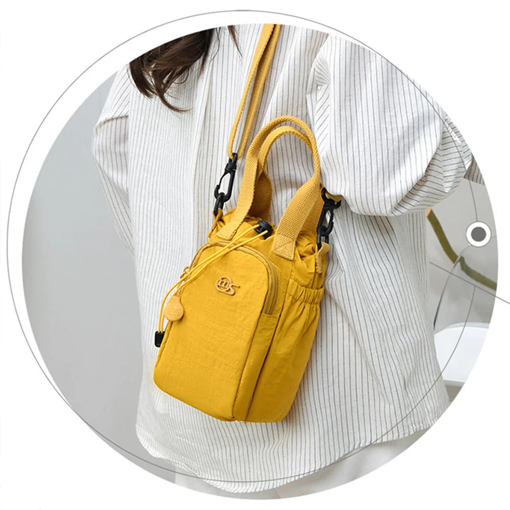 Women's Water-Resistant Crossbody Bag with Phone Pocket & Bottle Holder