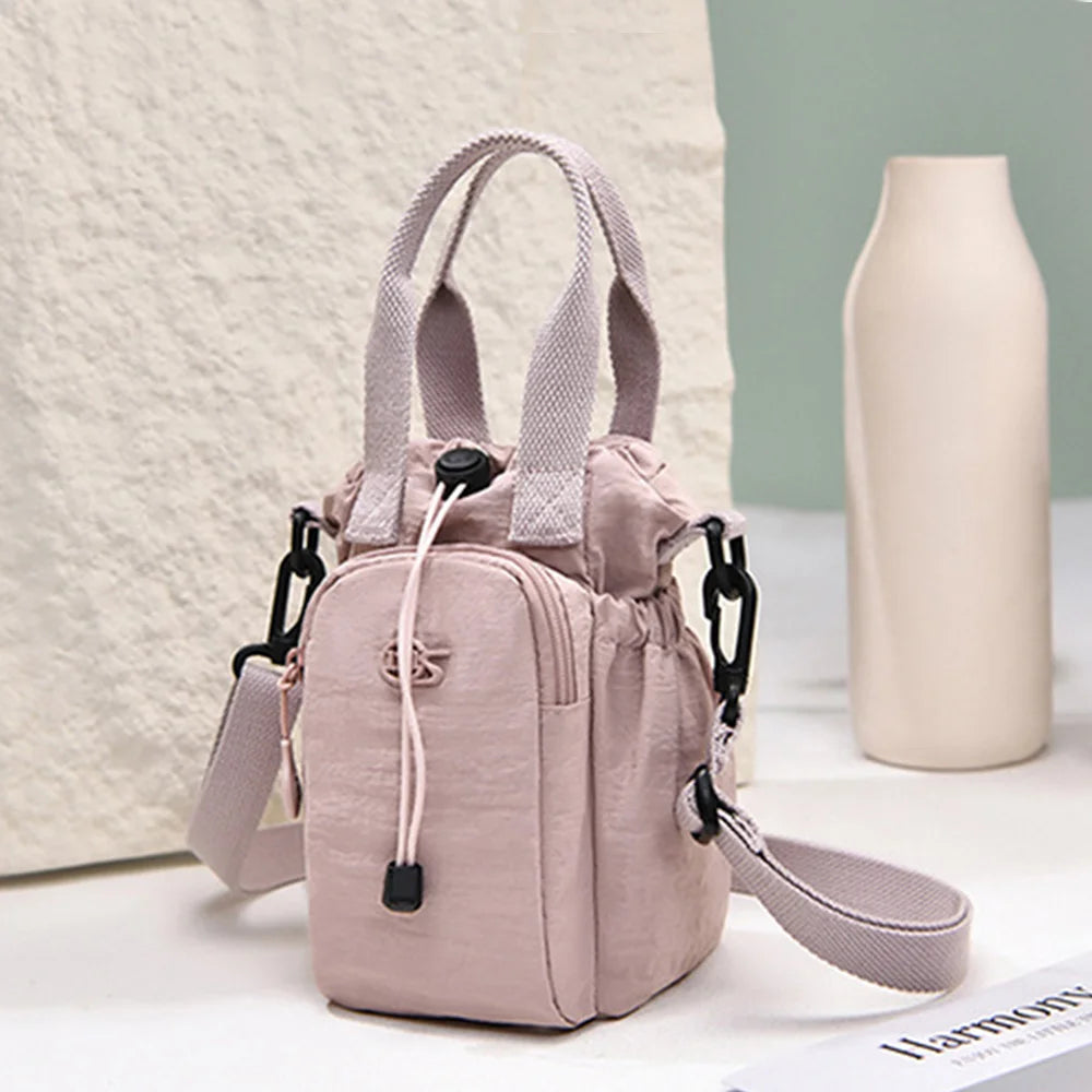 Women's Water-Resistant Crossbody Bag with Phone Pocket & Bottle Holder